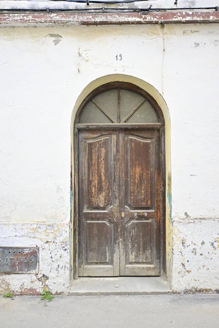 Weathered double doors with number 11